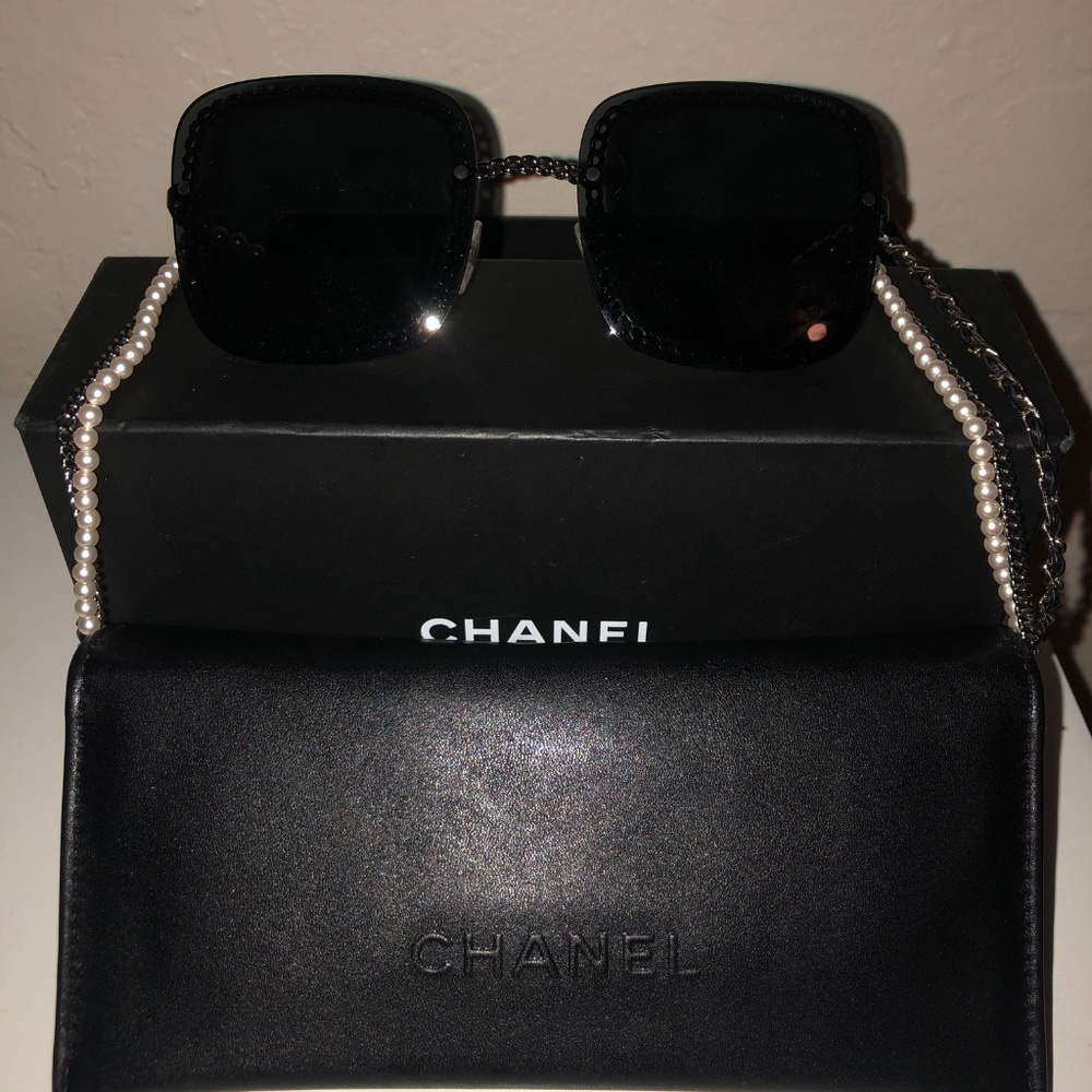 3 in 1 Chanel :  sunglasses/leather case OR small bag/ chain OR necklace